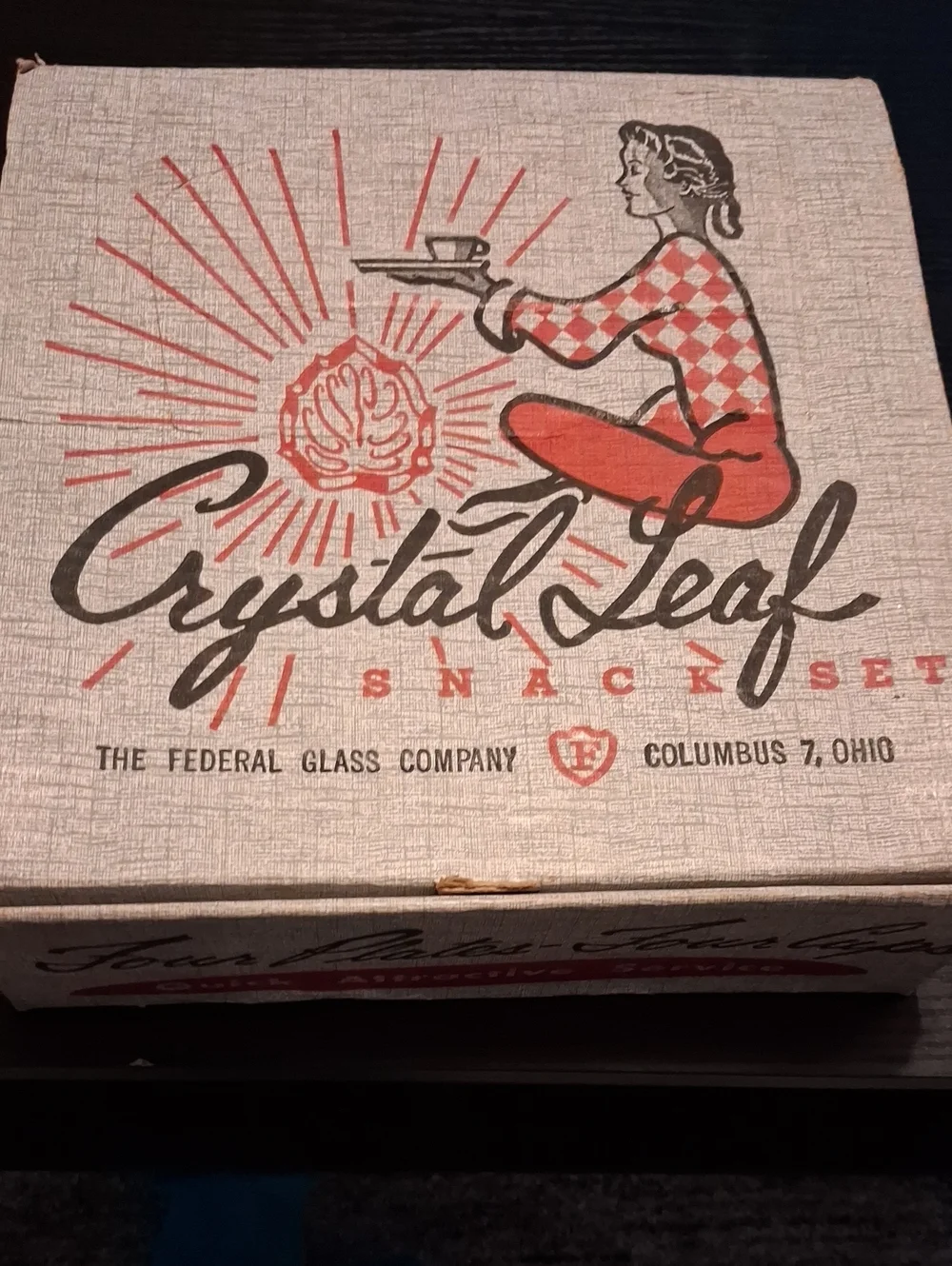 Four Glass Plates And Four Glass Cups